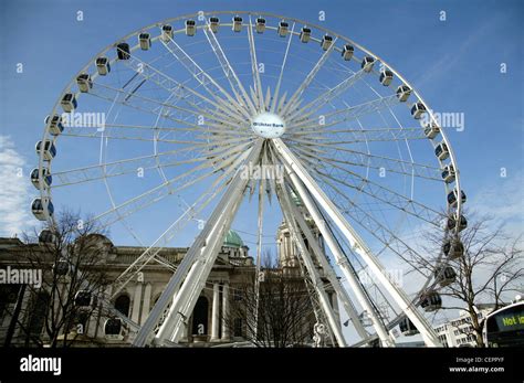 Exterior View Of Belfast City Hall And The Belfast Wheel Stock Photo