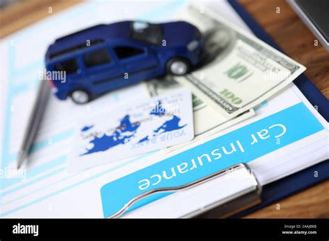 Car Insurance Paper Form With Cash And Credit Card Stock Photo Alamy
