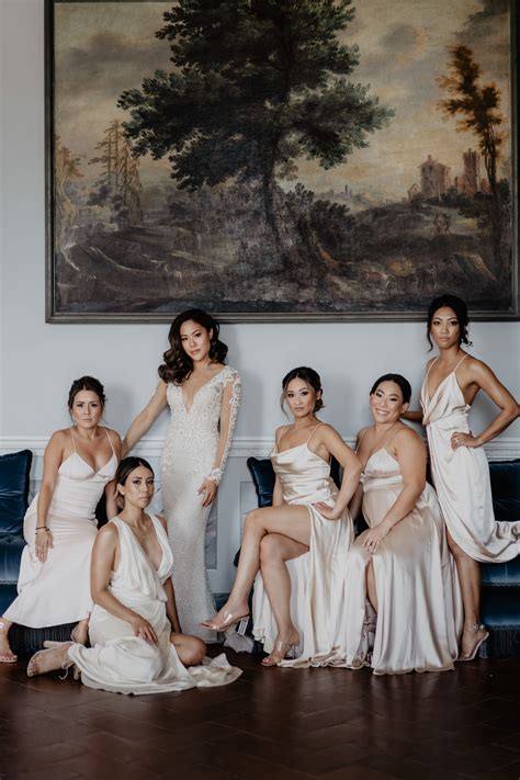 Gorgeous bridal party photo with silk and lace gowns by David Bastianoni