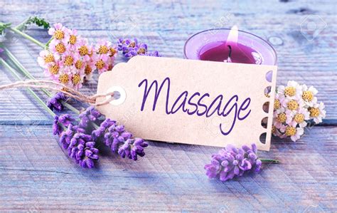 31202579 Spa Massage Background With Fragrant Fresh Lavender And Flowers With A Burning