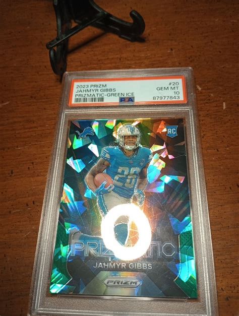 2023 Panini Green Ice Prizm Prizmatic Jahmyr Gibbs Lions RC Rookie PSA