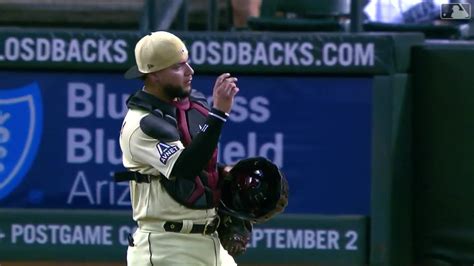 Jose Herrera searches the ground for his earpiece | 07/28/2023 | Arizona Diamondbacks