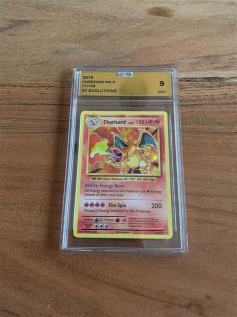 XY EVOLUTIONS Pokémon Graded Card CHARIZARD HOLO UCG 9 Catawiki