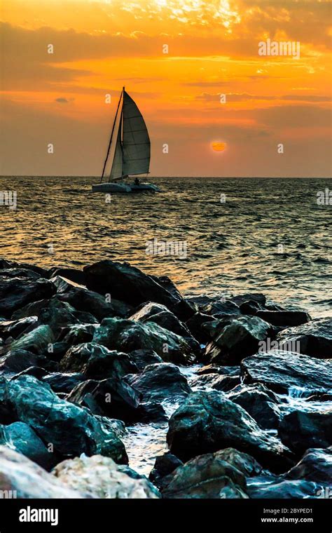 Yacht Sailing Against Sunset Holiday Lifestyle Landscape With Skyline