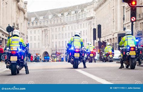 Metropolitan Police Motorcycle Riders Escort A Protest Demonstration In