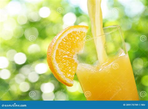 Orange Juice Pouring Into Glass Stock Image Image Of Food Still