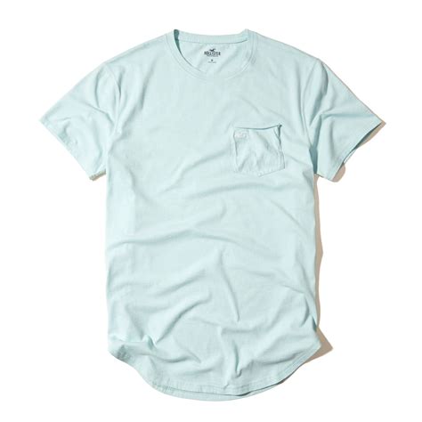 Lyst Hollister Curved Hem Pocket T Shirt In Blue For Men