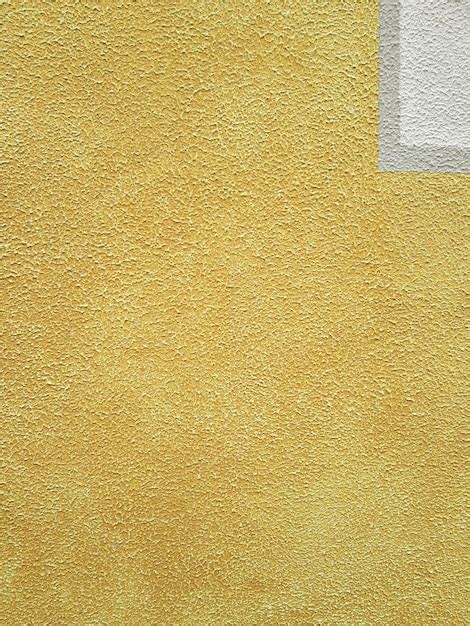 Premium Photo Full Frame Shot Of Yellow Plastered Concrete Wall