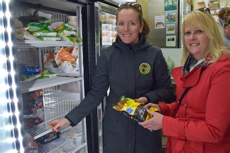 Community Helps Fill Food Bank Fridge 4 Photos