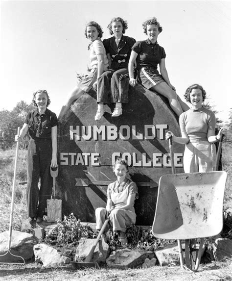 Students Pose For A Photo By The Old Humboldt State College Sign