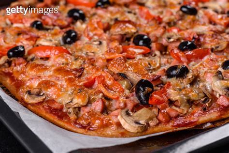 Homemade Vegetable Pizza With Addition Of Tomatoes Olives And Herbs