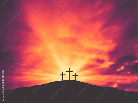 Three Christian Easter Crosses On Hill Of Calvary With Colorful Clouds In Sky Crucifixion Of