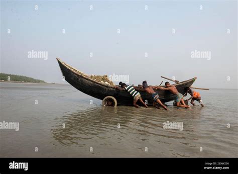 Fishermen Return From Sea With Fish And They Are Trying To Keep Their