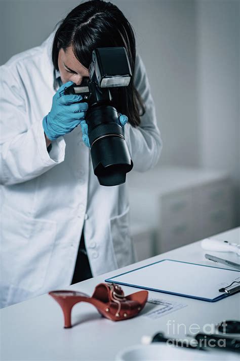 Forensics Expert Examining Crime Scene Evidence Photograph By Microgen Images Science Photo