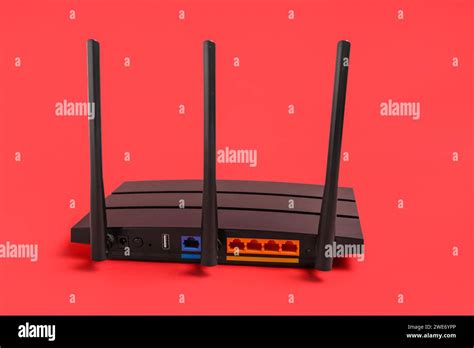 Modern Wi Fi Router On Red Background Stock Photo Alamy