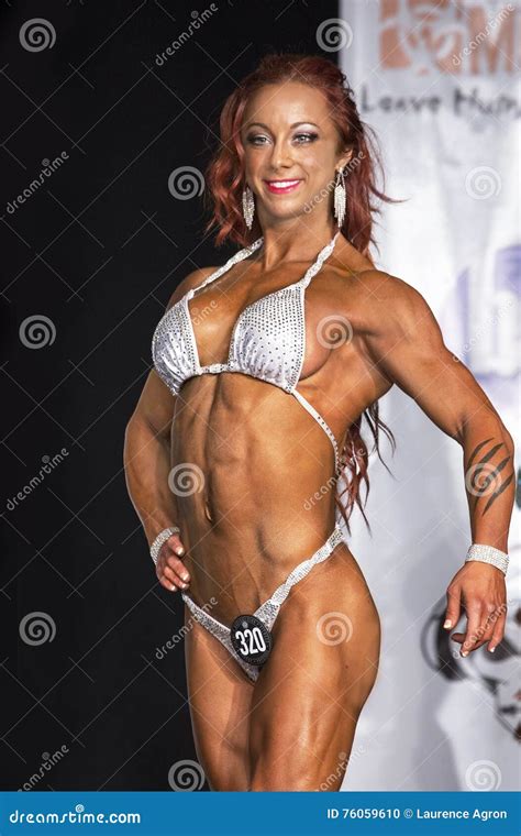 Sizzling Hot Redheaded Woman Bodybuilder Editorial Image