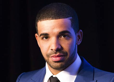Download Drake performing live on stage | Wallpapers.com