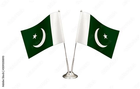 Pakistan table flag isolated on white ground. Two flag poles with flags ...