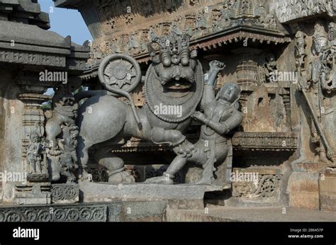 Carved sculptures on the outer wall of the Chennakeshava Temple complex ...