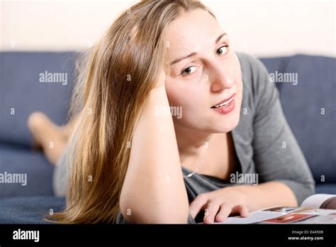 Brunette Reading Magazine Studio Stock Photo Alamy