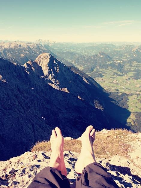 Premium Photo Tired Legs Rest In Hike In Mountains Naked Feets