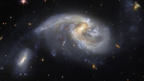 NASA Hubble Space Telescope Capture Arp 72 Two Interacting Galaxies NGC