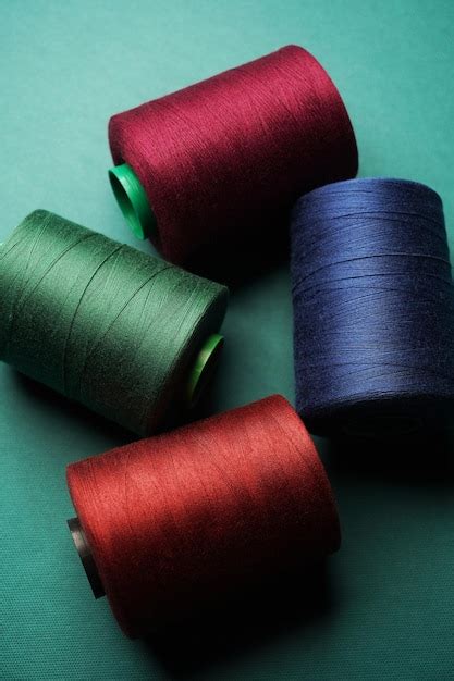 Premium Photo Colorful Thread Spool Background Closeup