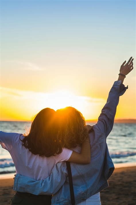 Women at the Beach During Sunset · Free Stock Photo