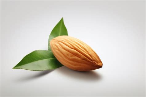 Premium AI Image | A almond with green leaves on it