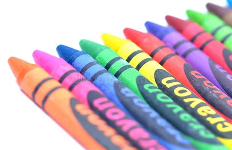 Close Up Of Colorful Wax Crayons Of All Colors Lined Up Isolated On