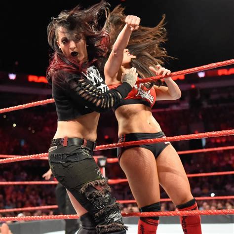 Photos Bella Twins Return To Raw But Run Into Trouble Vs The Riott