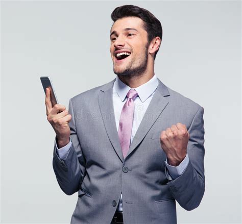 Cheerful Businessman Holding Smartphone Stock Photo Image Of