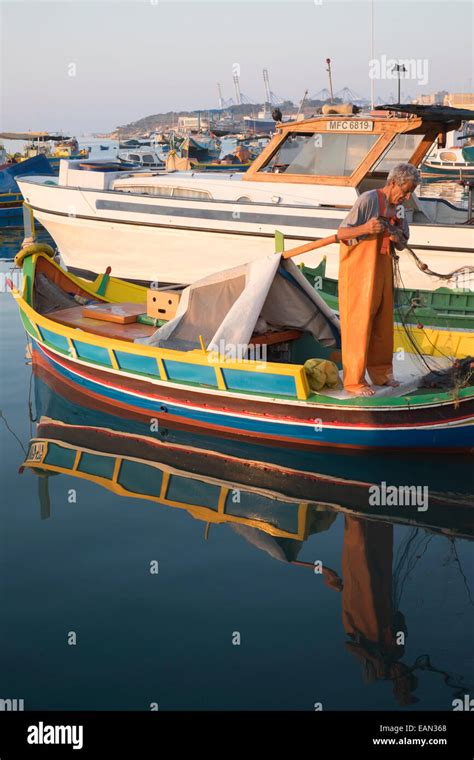 Fisherman At Marsaxlokk In Malta Stock Photo Alamy