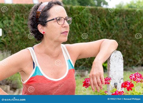 Portrait Of A Middle Aged Brunette Woman With Eyeglasses Outdoor Stock Photo Image Of