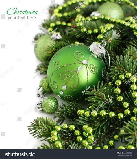 Photo De Stock Green Christmas Ornaments Border On White 533691217