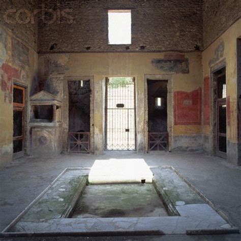 An Empty Room With Several Doors And Windows On The Walls One Door