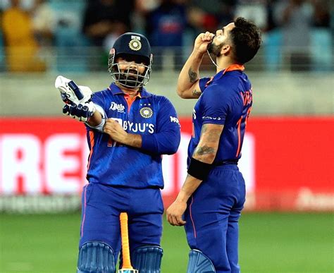 Dubaiindias Virat Kohli Right Kisses The Locket After Scoring A