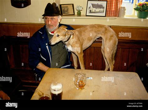 Taking the dog to the village pub. One man and his dog the Kings Head ...