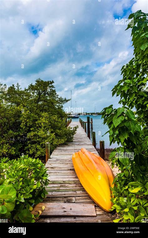 Ocean Kayak On Wooden Dock Leading To The Ocaan In The Abaco Islands