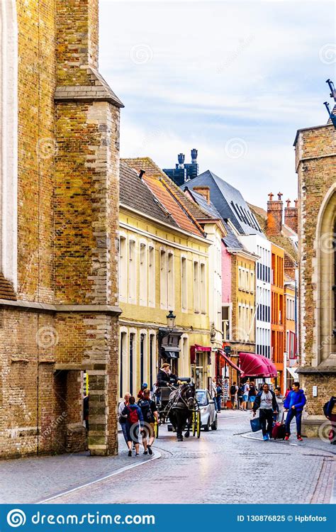 Horse And Cariage On The Cobblestone Street Mariastraat In The Center