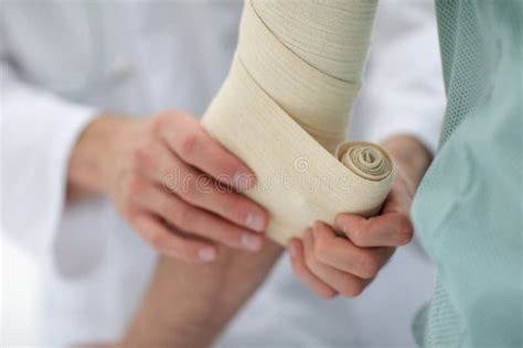 Closeup Doctor Applying Elastic Bandage Stock Photo Image Of Illness