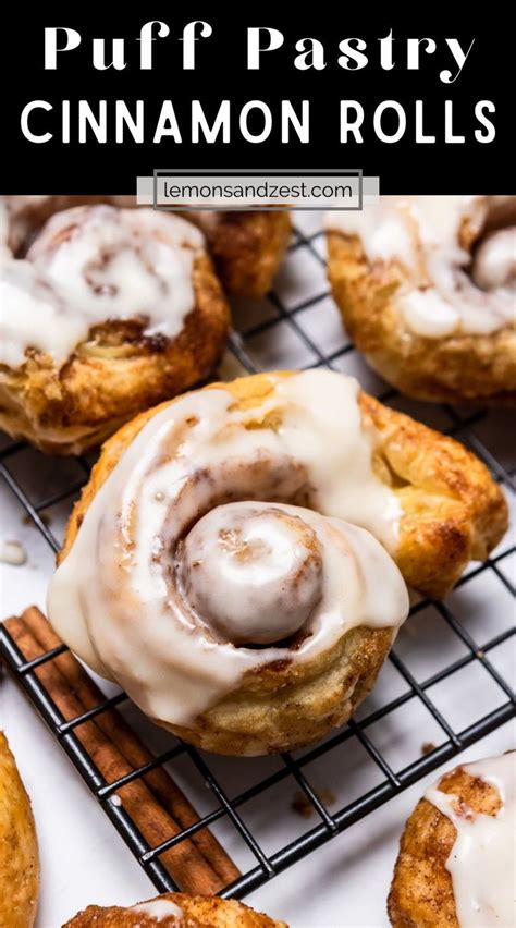 Cinnamon Rolls With Icing On A Cooling Rack