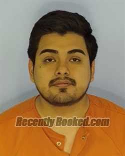 Recent Booking Mugshot For Hector Manuel Marroquin Ajanel In Walton