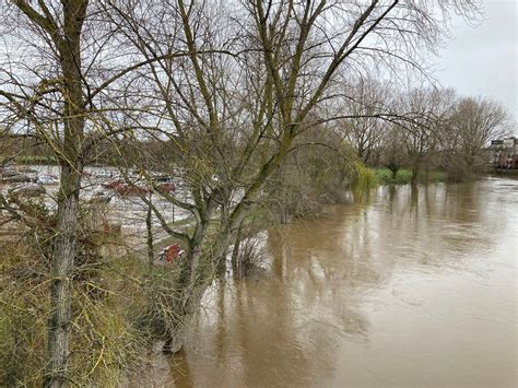 Flood barriers go up in Shrewsbury with some county roads under water ...