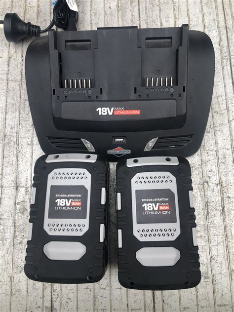 2 X Briggs And Stratton 18v 5 0 Ah Demo Lithium Ion Batteries And Charger Victa Ebay