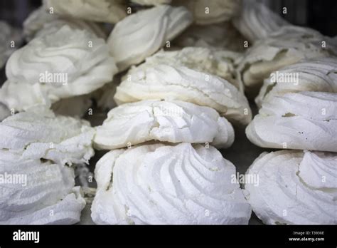 Merengue cakes in pastry, dessert and sweets, food Stock Photo - Alamy