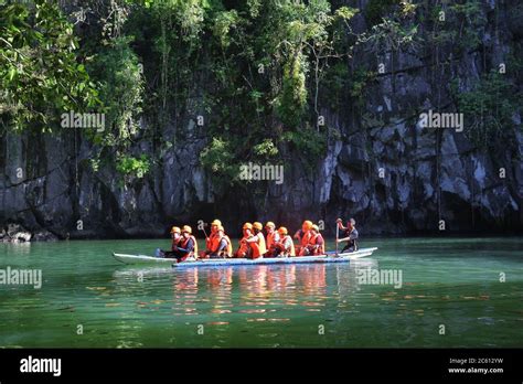 PUERTO PRINCESA, PHILIPPINES - NOVEMBER 29, 2017: People ride the boats to underground river in ...