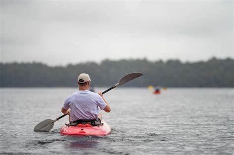 Premium Photo | Kayaking on the river at sunset in australia