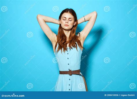 Pretty Woman In Blue Dress Holding Her Hair Glamor Attractive Look Blue