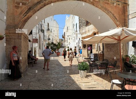Tourists In A Street In The Centro Storico Ostuni Puglia Italy Stock
